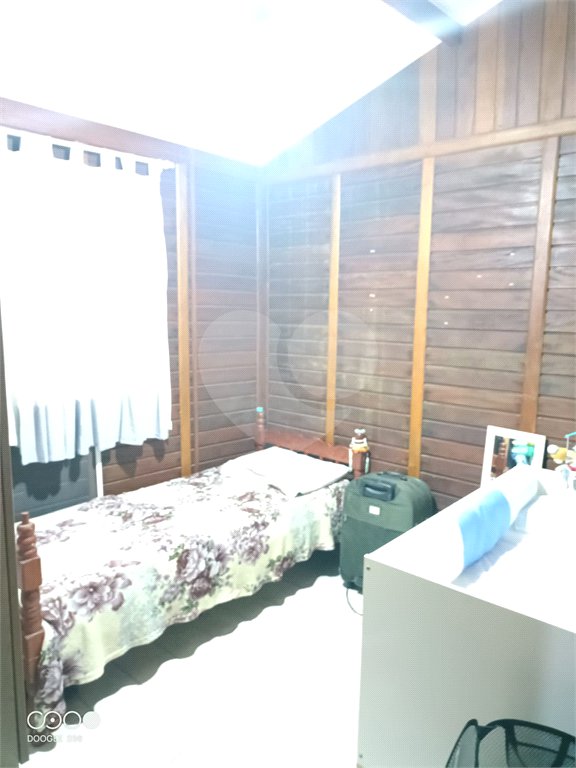 Casa à venda com 4 quartos, sendo 1 suíte,  no condomínio Morada da Praia, Bertioga - SP