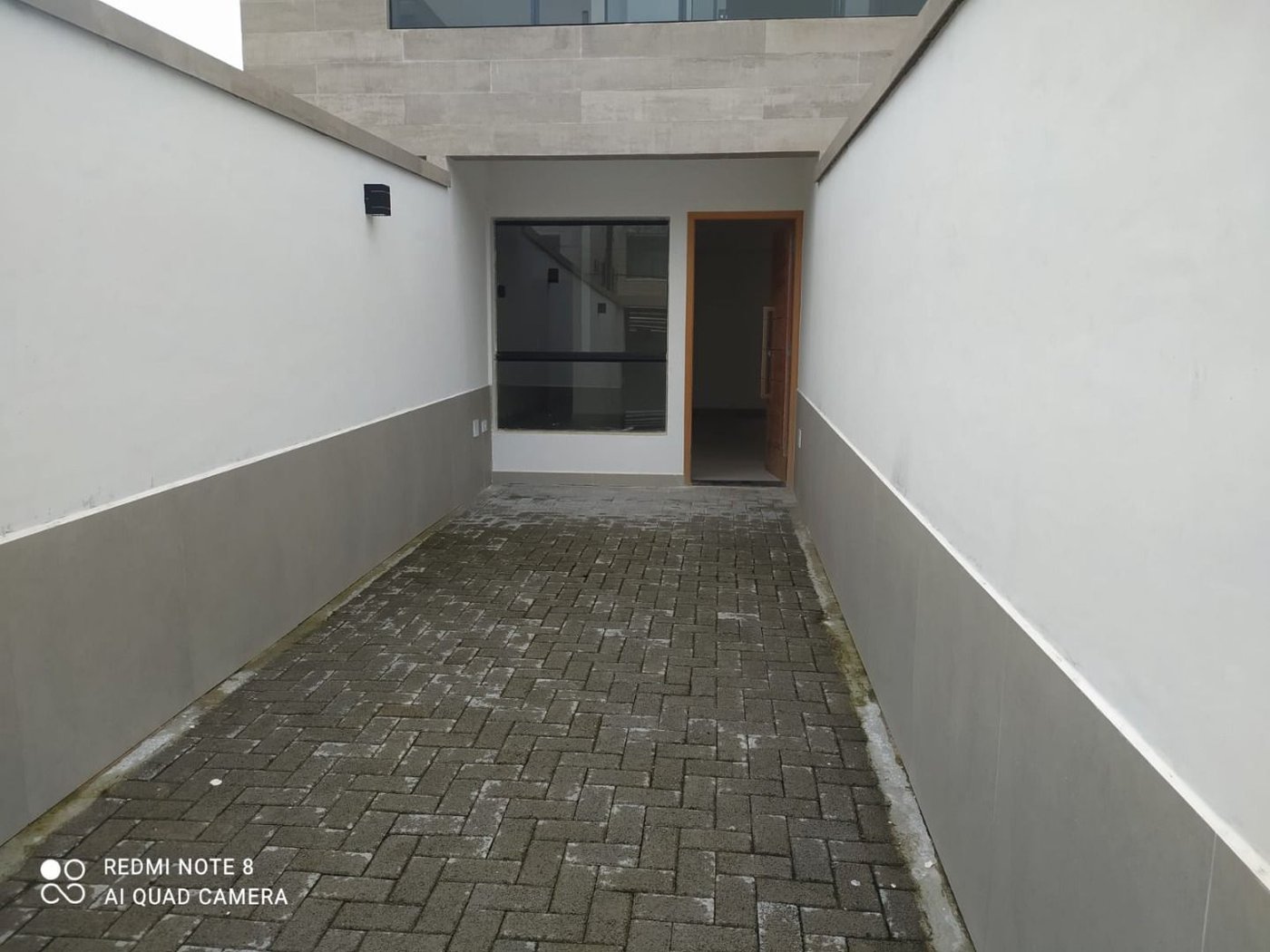 Casa com 3 dormitórios à venda, 92 m² por R$ 798.000,00 - Estuário - Santos/SP