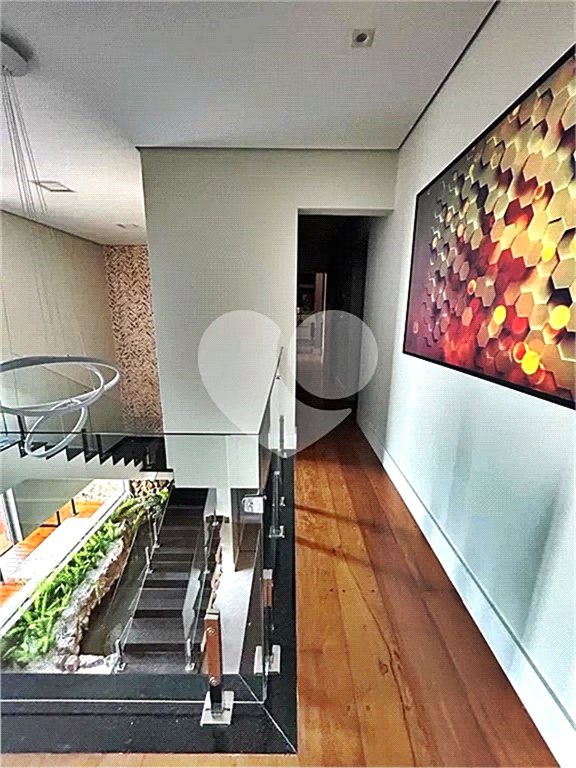 Terreno à venda com 4 suítes no condomínio Suíça da Cantareira, Mairiporã - SP