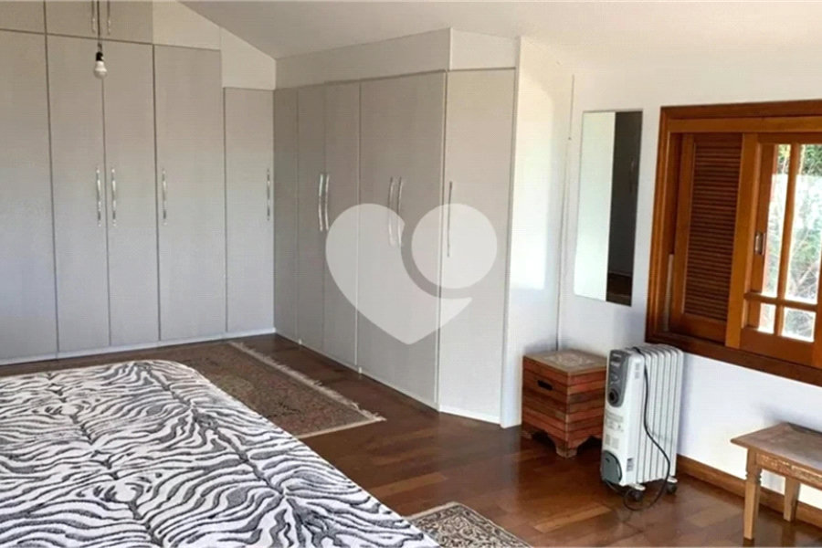 Casa à venda com 4 suítes no condomínio Suíça da Cantareira, Mairiporã - SP
