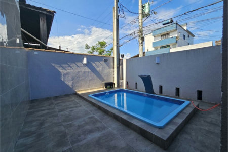 Casa com 2 dormitórios à venda, 95 m² por R$ 595.000,00 - Macuco - Santos/SP