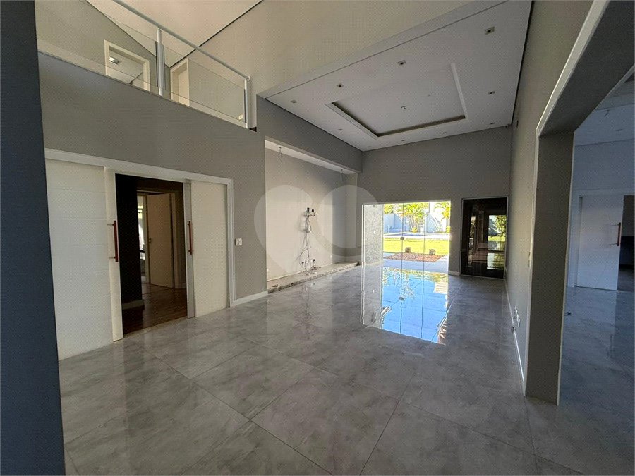 Casa alto padrão condomínio fechado em Atibaia com 4 suítes e ampla área de lazer, espaço gourmet, piscina, 6 vagas garagem