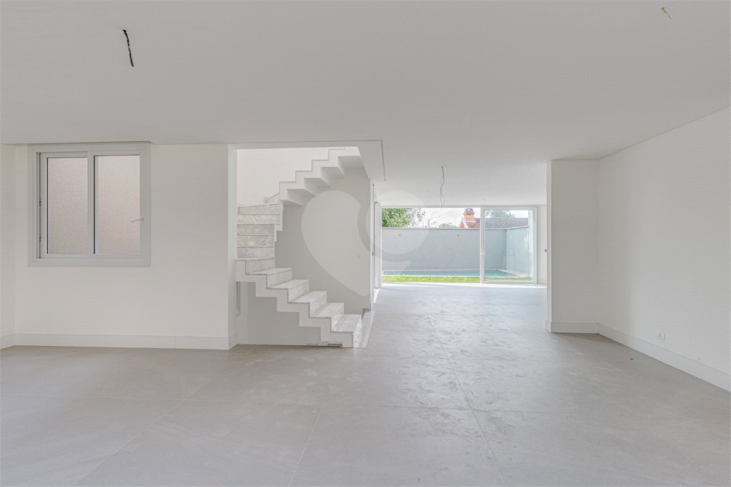 Casa à venda com 4 suítes no condomínio Vila Arese, São Paulo - SP