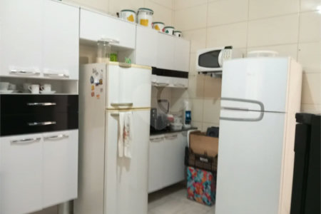 Terreno á venda com 2 casas na Vila Rosália, Guarulhos, SP.
