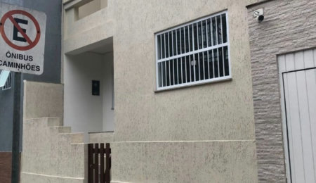 Casa com 3 dormitórios à venda, 116 m² por R$ 690.000,00 - Gonzaga - Santos/SP