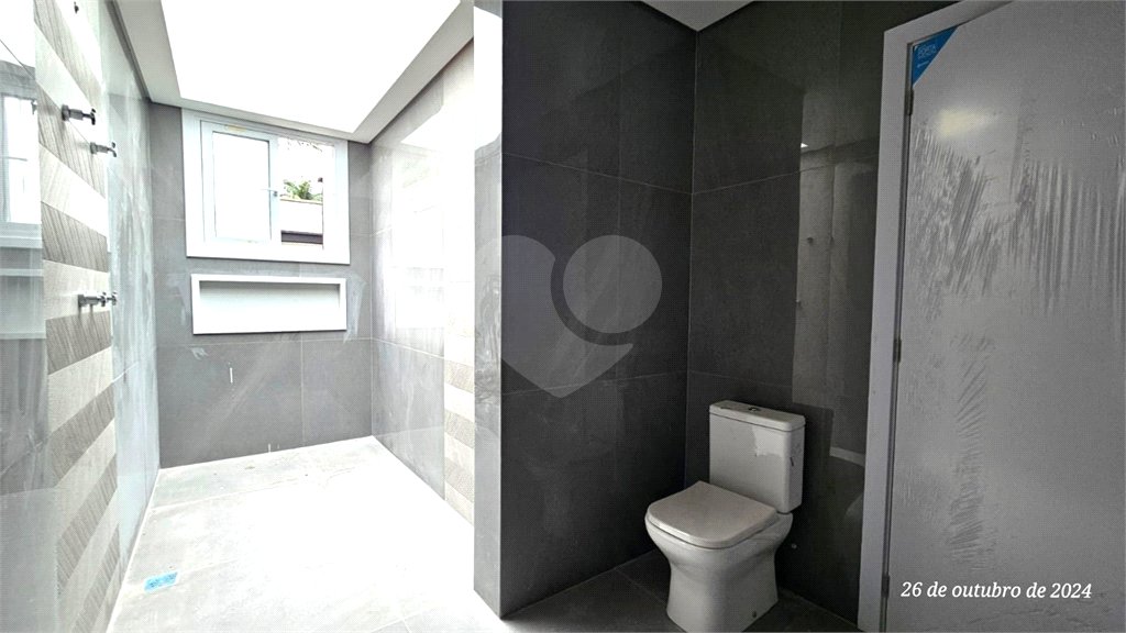 Casa à venda com 4 suítes no condomínio Vila Arese, São Paulo - SP