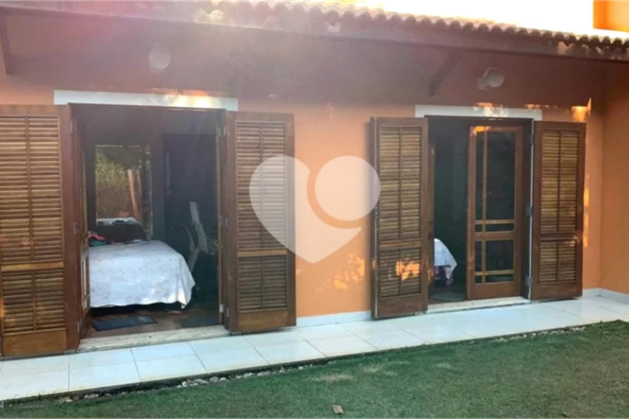 Casa à venda com 4 suítes no condomínio Suíça da Cantareira, Mairiporã - SP