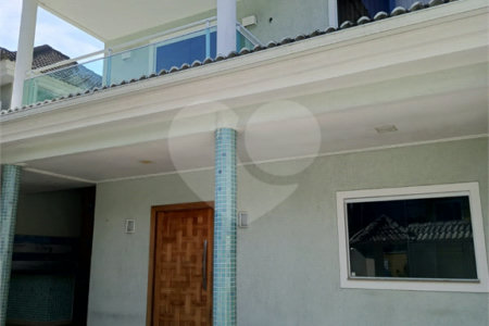 Casa à venda com 4 quartos, sendo 1 suíte, no condomínio Atlantico Sul, Rio de Janeiro - RJ