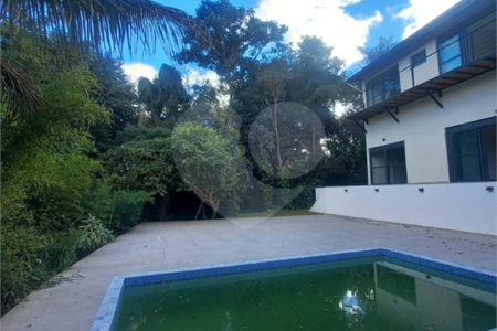 Casa à venda com 4 suítes no condomínio Estância Marambaia, Vinhedo - SP