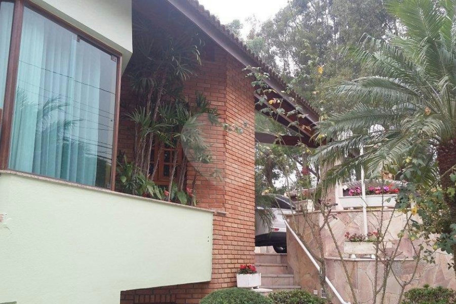 CASA TÉRREA A VENDA NO TREMEMBÉ - 4 SUÍTES E 10 VAGAS DE GARAGEM