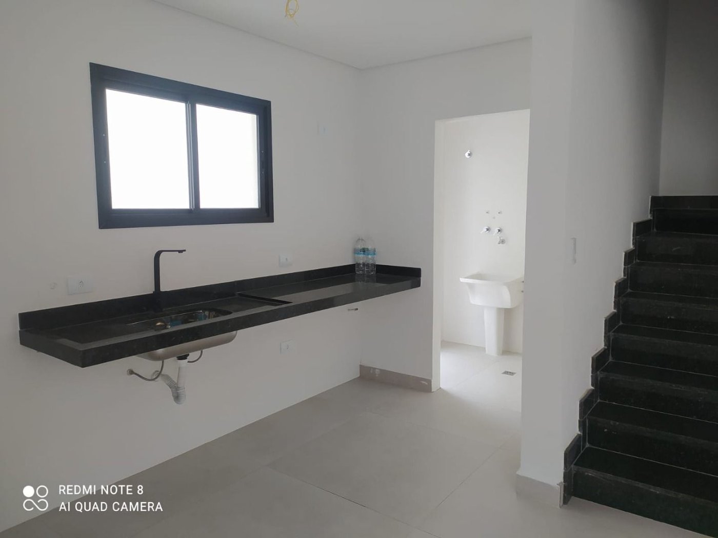 Sobrado com 3 dormitórios à venda, 107 m² por R$ 825.000,00 - Estuário - Santos/SP