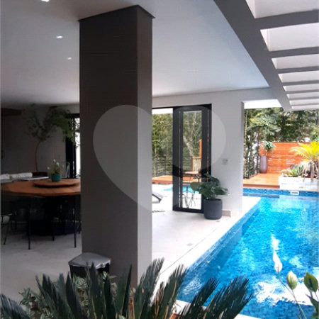 Casa à venda com 4 suítes no condomínio Jardim Itatinga, São Paulo - SP
