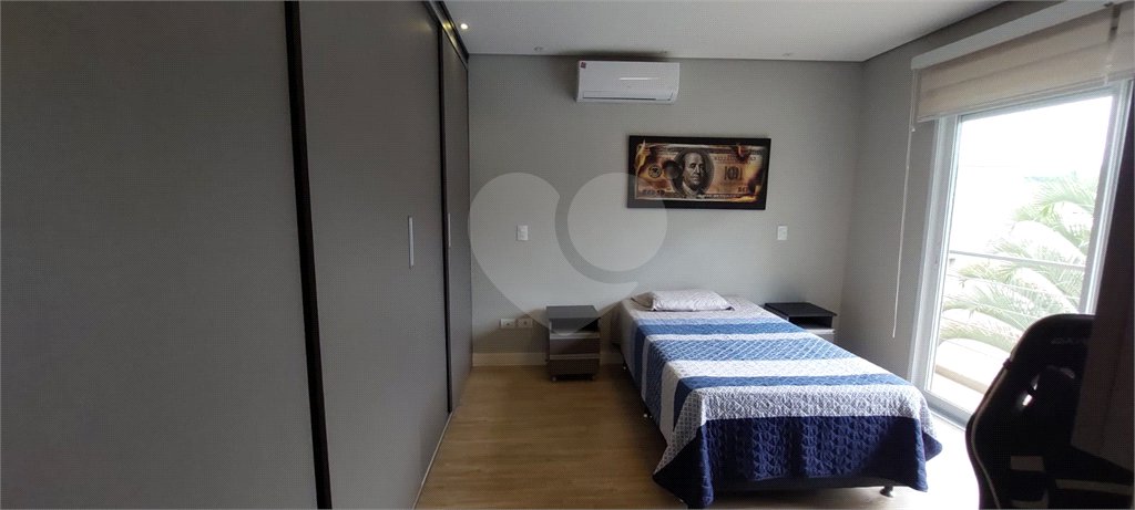 Casa à venda com 4 suítes no condomínio Figueira Garden, Atibaia - SP