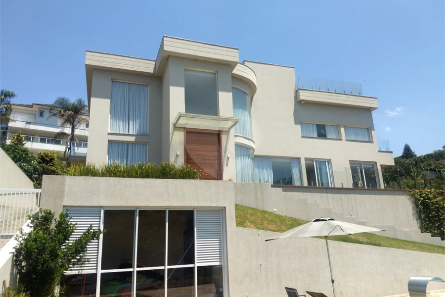 Casa à venda ou para alugar com 4 suítes no condomínio Suíça da Cantareira, Mairiporã - SP
