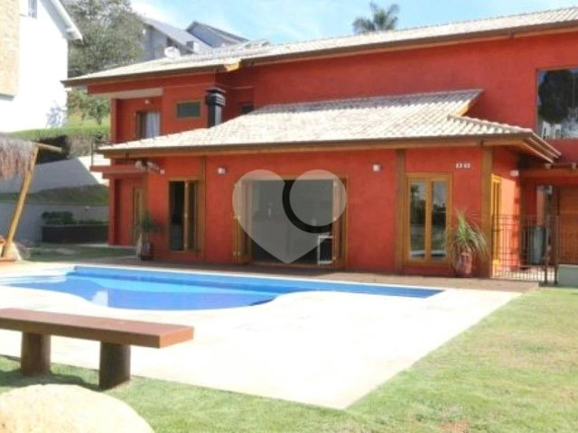 Casa à venda com 4 suítes no condomínio Suíça da Cantareira, Mairiporã - SP