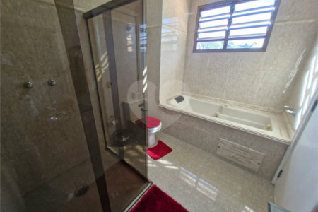 Casa à venda com 4 suítes no condomínio Villa Viana II, Cotia - SP
