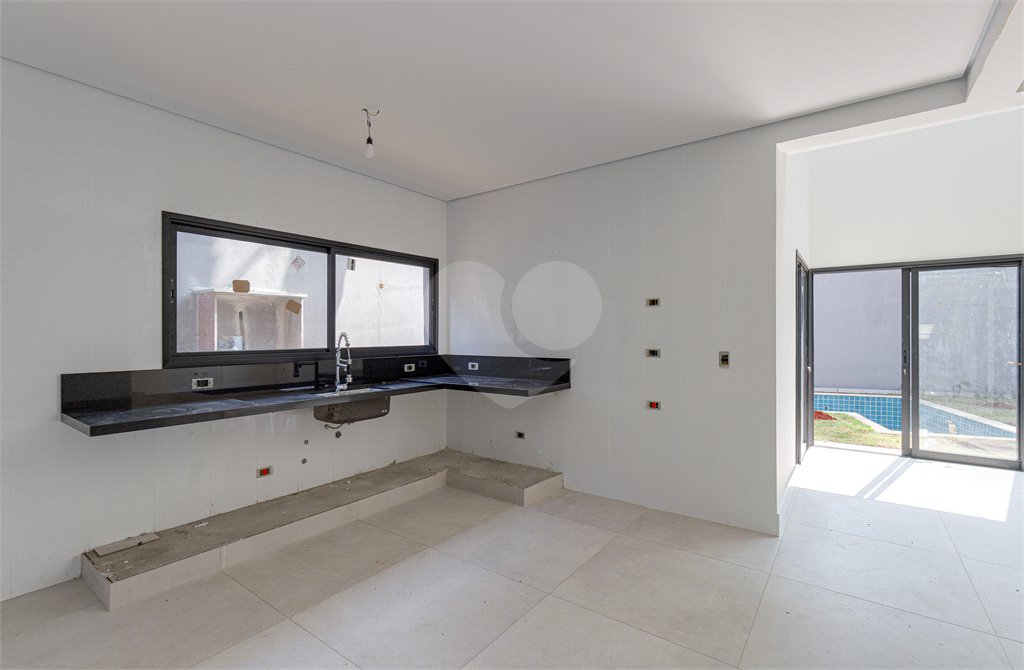 Casa à venda com 4 suítes no condomínio Reserva Robélia, São Paulo - SP