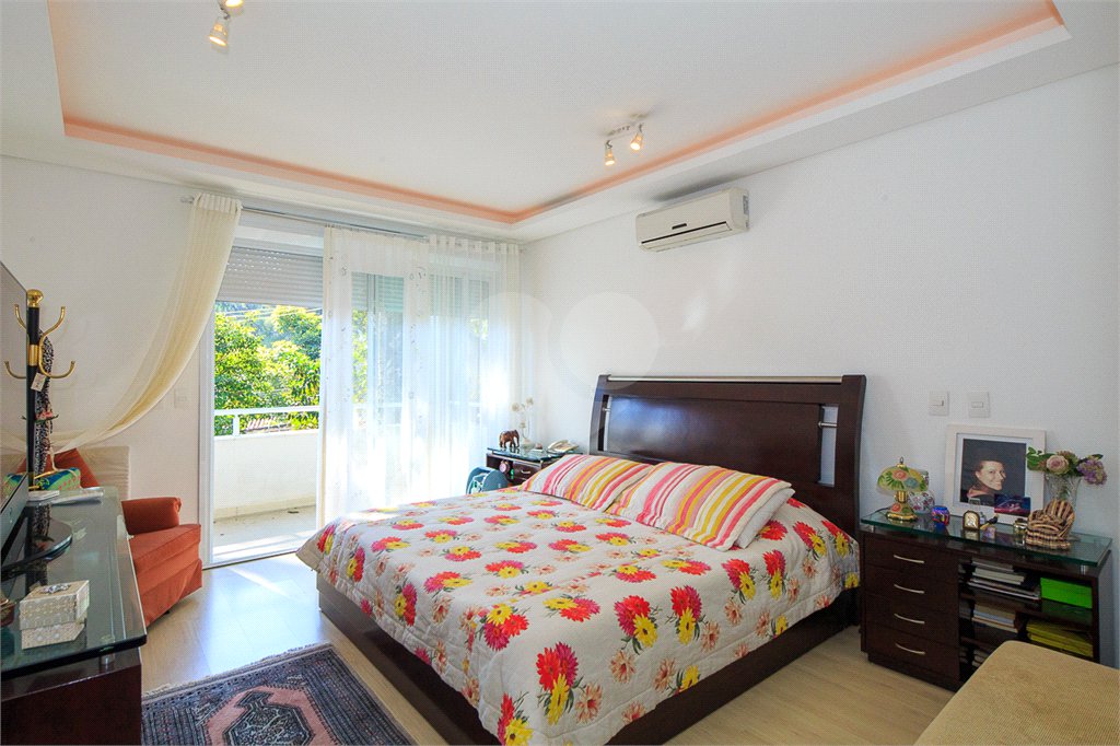 Casa à venda com 4 suítes no condomínio Vila Alba, São Paulo - SP