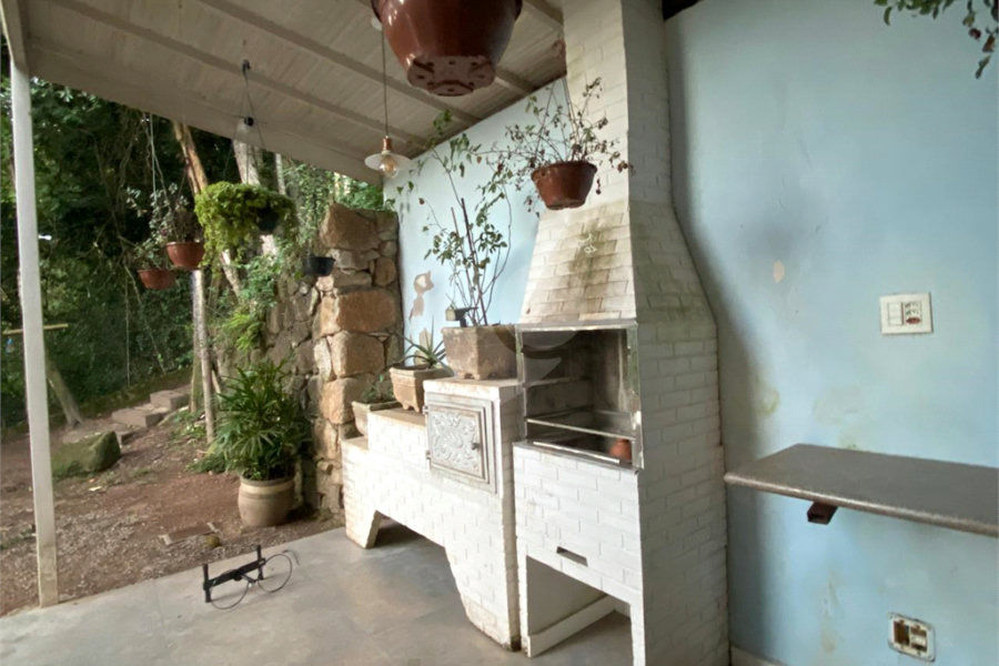 Casa à venda com 4 suítes no condomínio Alpes da Cantareira, Mairiporã - SP