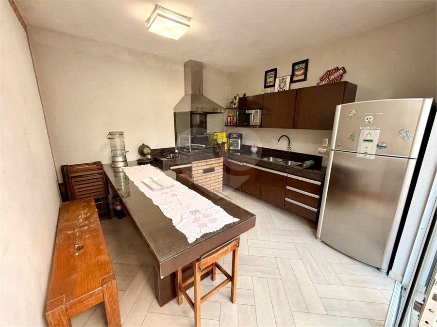 Casa à venda com 3 suítes no condomínio Villaggio Della Hípica, São Paulo - SP