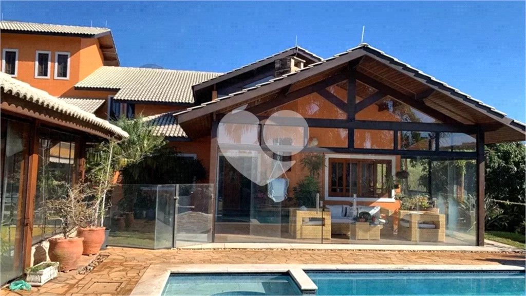 Casa à venda com 4 suítes no condomínio Suíça da Cantareira, Mairiporã - SP