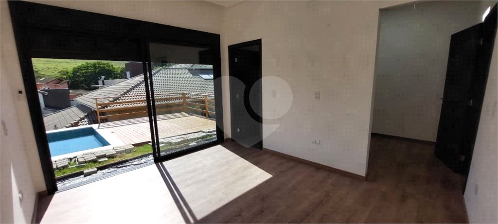 Casa à venda com 4 suítes no condomínio Figueira Garden, Atibaia - SP