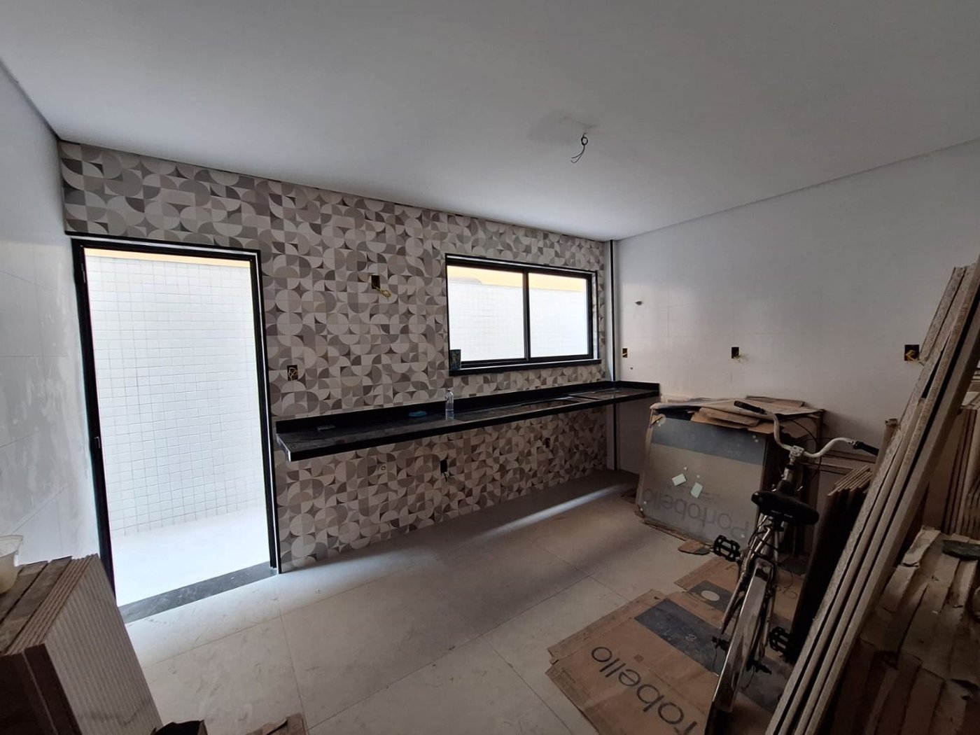 Casa com 3 dormitórios à venda, 140 m² por R$ 1.580.000,00 - Ponta da Praia - Santos/SP