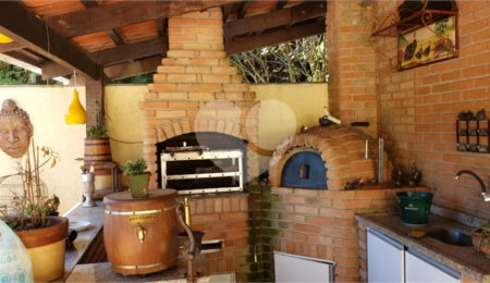 Casa à venda com 4 suítes no condomínio Alpes da Cantareira, Mairiporã - SP