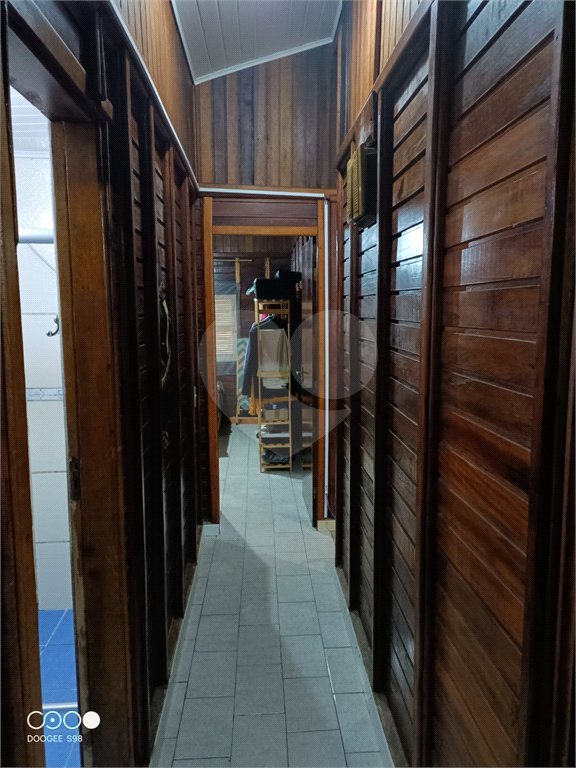 Casa à venda com 4 quartos, sendo 1 suíte,  no condomínio Morada da Praia, Bertioga - SP