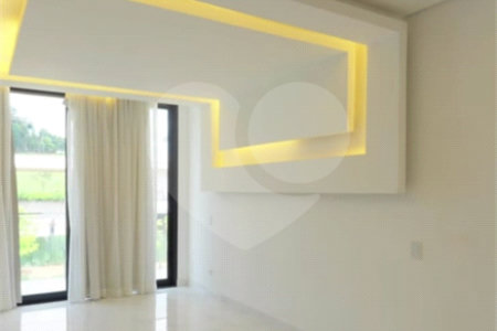 Casa à venda com 4 suítes no condomínio Figueira Garden, Atibaia - SP