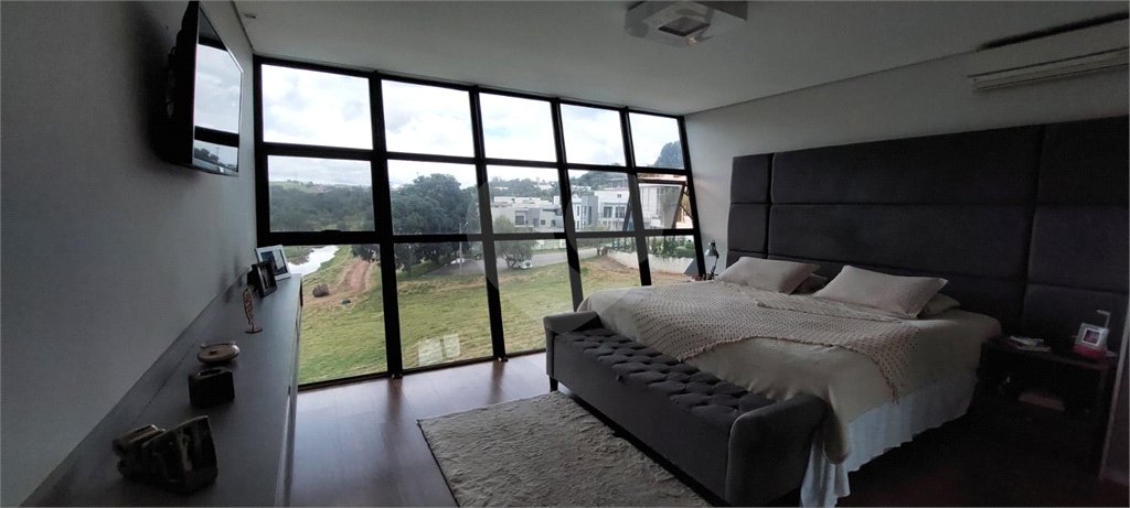 Casa à venda ou para alugar com 4 suítes no condomínio Figueira Garden, Atibaia - SP