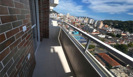 Apartamento com 2 dormitórios à venda, 58 m² por R$ 478.000,00 - Centro - São Vicente/SP