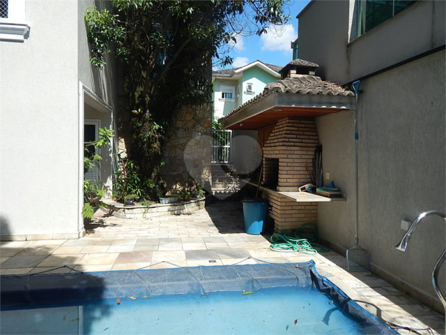 Casa à venda com 3 suítes no condomínio Quinta de Santo Antônio, São Paulo - SP