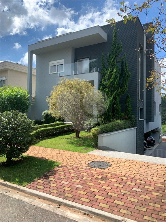 Casa à venda ou para alugar com 4 suítes no condomínio Residencial Gênesis 1, Santana de Parnaíba - SP