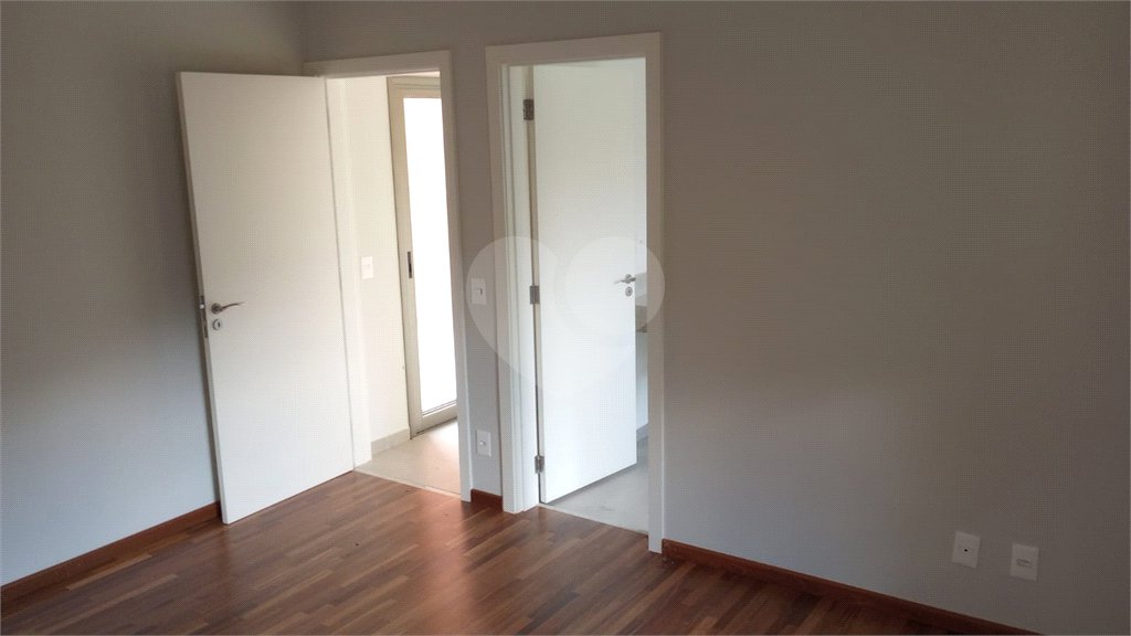 Casa à venda com 4 suítes no condomínio Estância Marambaia, Vinhedo - SP