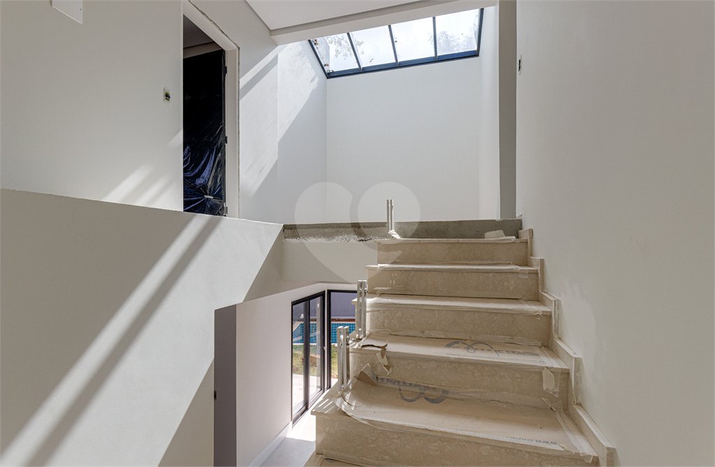 Casa à venda com 4 suítes no condomínio Reserva Robélia, São Paulo - SP