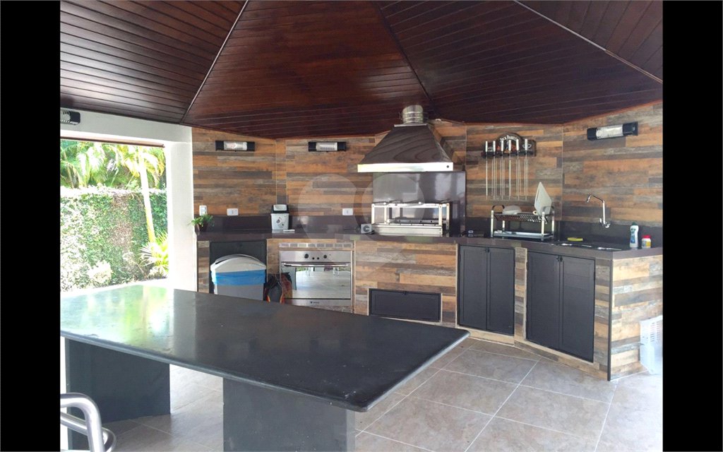 Casa à venda com 8 quartos, sendo 6 suítes,  no condomínio Acapulco, Guarujá - SP