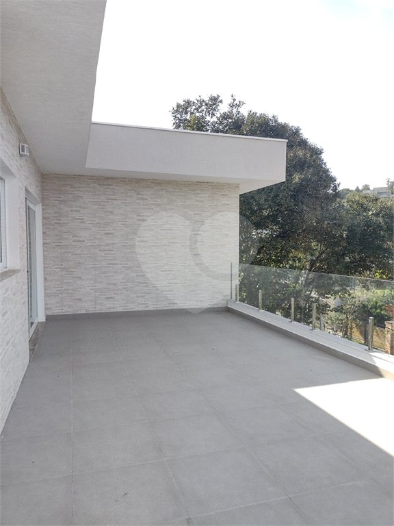 Casa à venda com 4 suítes no condomínio Estância Marambaia, Vinhedo - SP