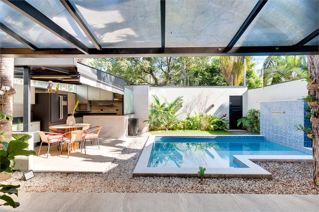 Casa à venda com 4 suítes no condomínio Villa Suiça, São Paulo - SP