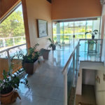Casa à venda com 4 suítes no condomínio Bougainville, Peruíbe - SP