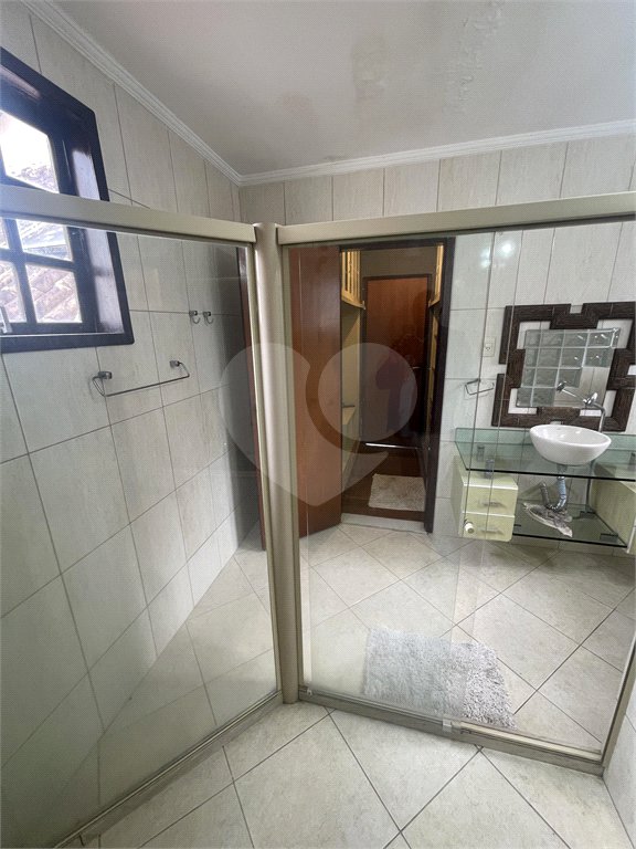 Casa à venda com 5 quartos, sendo 3 suítes, no condomínio Recanto das Palmeiras, Rio de Janeiro - RJ
