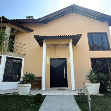 Casa à venda com 4 suítes no condomínio Parque Village Castelo, Itu - SP