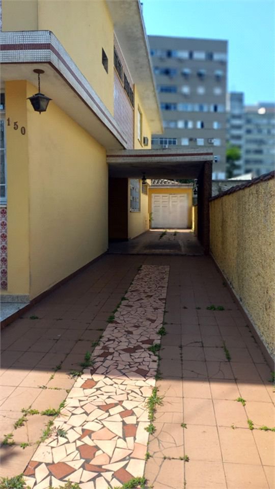 Casa com 3 dormitórios, 249 m² - venda por R$ 3.200.000,00 ou aluguel por R$ 21.351,00 - Encruzilhada - Santos/SP