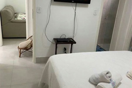 Apartamento Residencial à venda, Jardim Três Marias, Guarujá - AP1018.