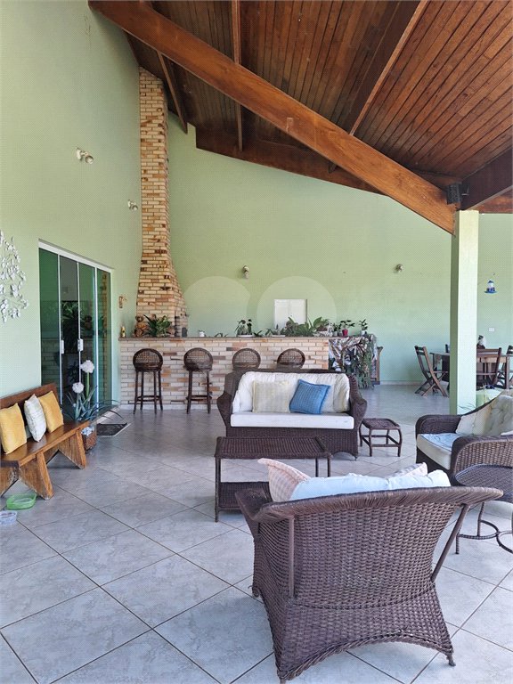 Casa à venda com 4 suítes no condomínio Bougainville, Peruíbe - SP
