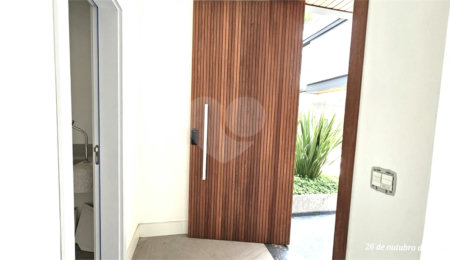 Casa à venda com 4 suítes no condomínio Vila Arese, São Paulo - SP