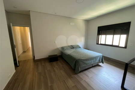 Casa à venda com 4 suítes no condomínio Figueira Garden, Atibaia - SP