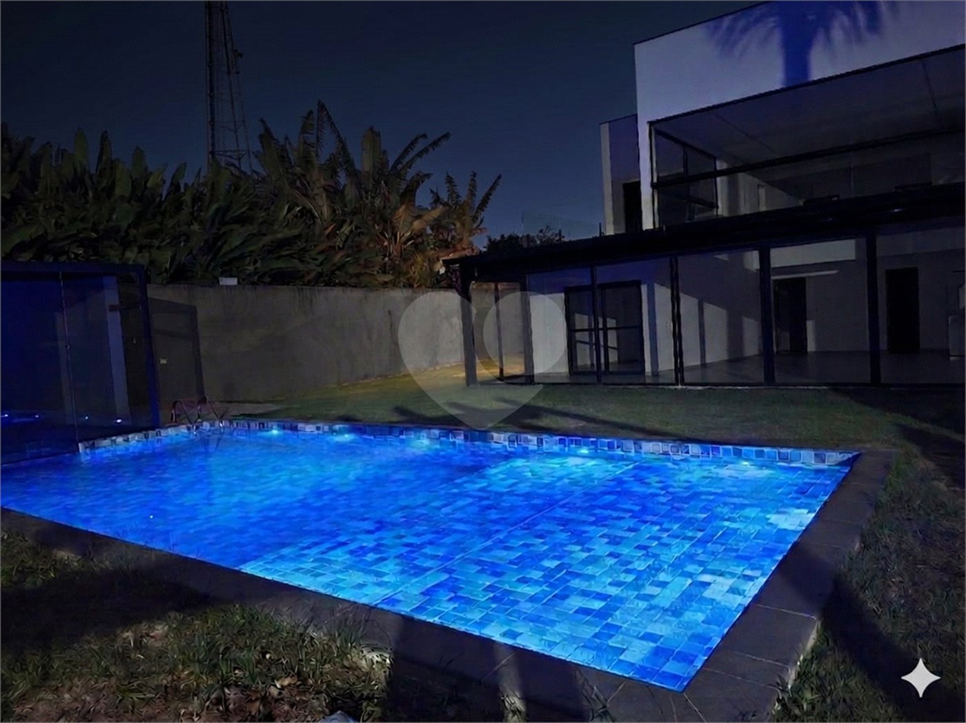 Casa à venda com 4 suítes no condomínio Park Lane, Guarujá - SP
