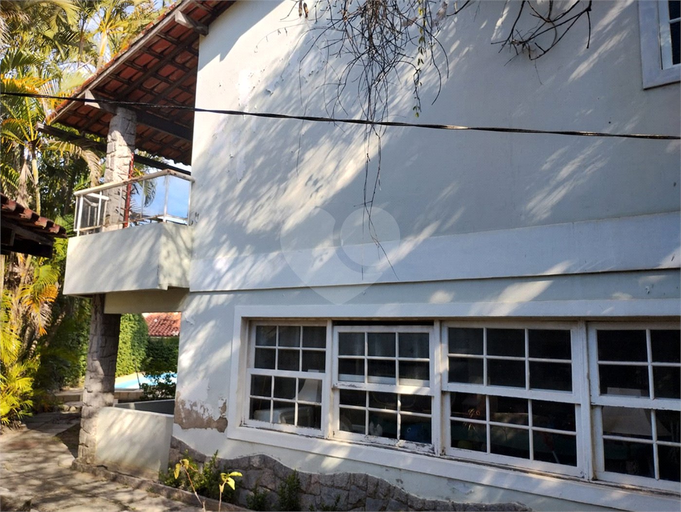 Casa à venda com 5 quartos, sendo 3 suítes, no condomínio Vilarejo, Rio de Janeiro - RJ