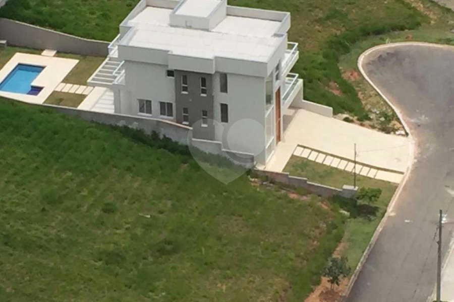 Casa à venda com 4 suítes no condomínio Santa Maria, Cotia - SP